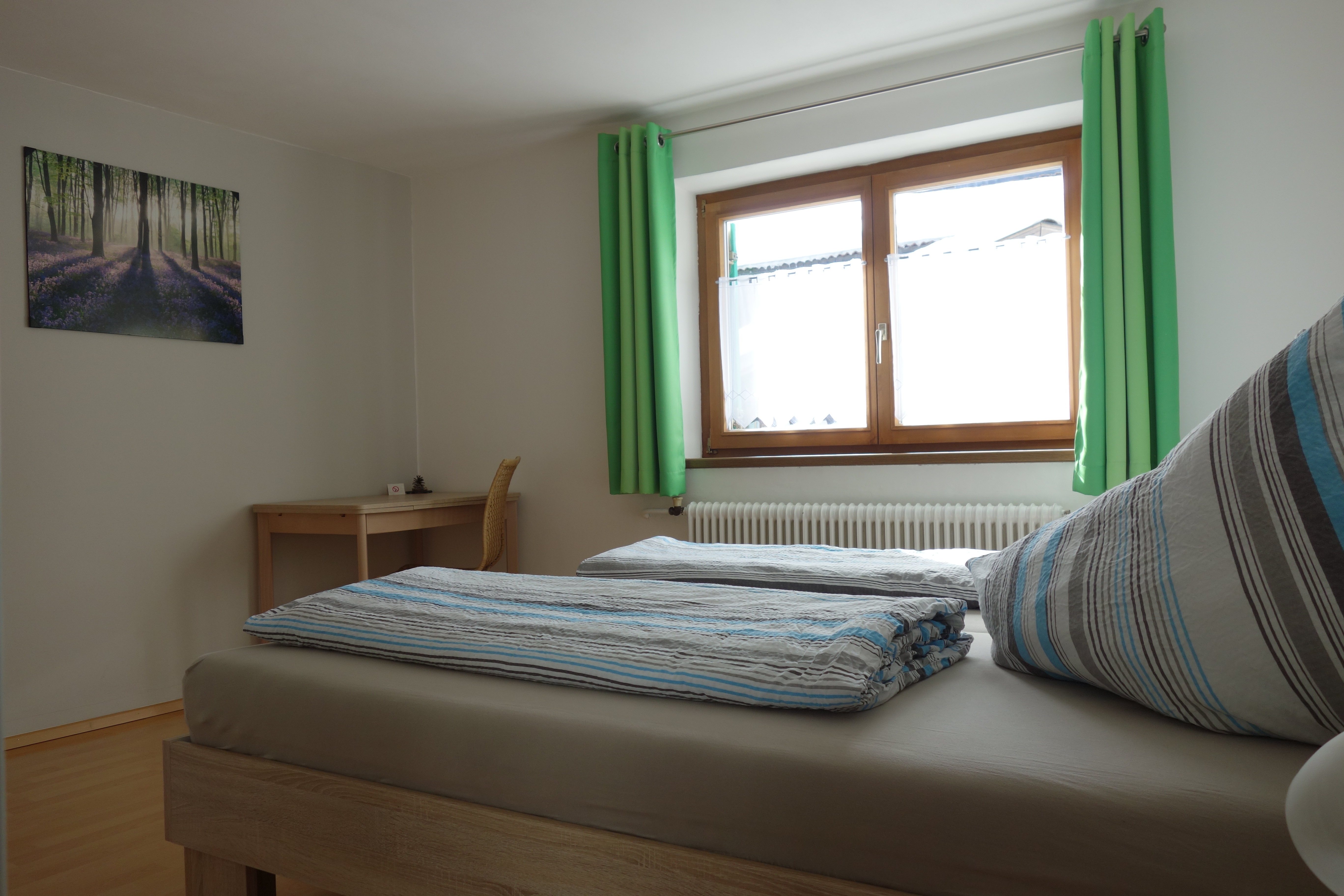 Schlafzimmer 1 der Ferienwohnung Astra